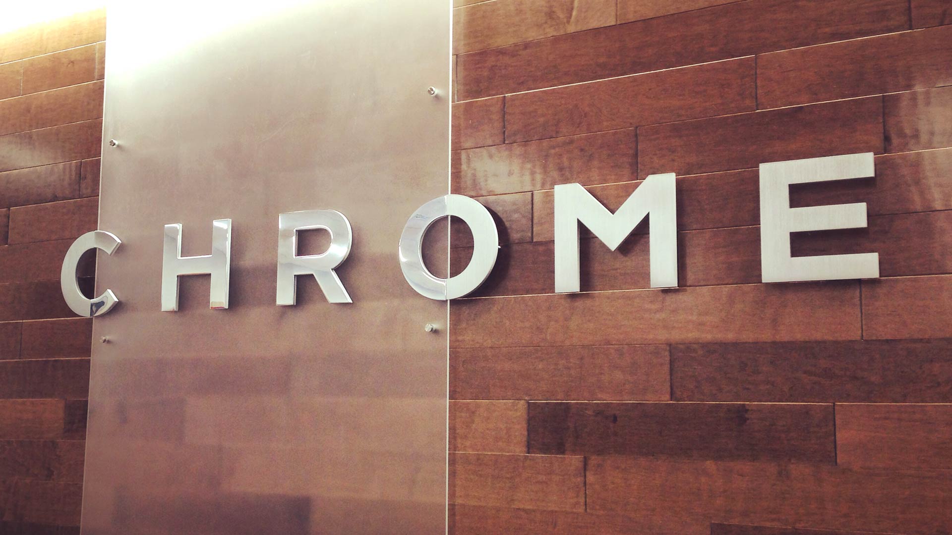 Chrome branded interior wall with "shine"