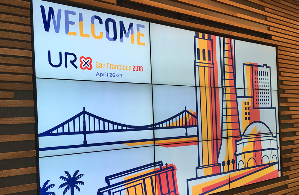 URX 2018 branded digital welcome screen