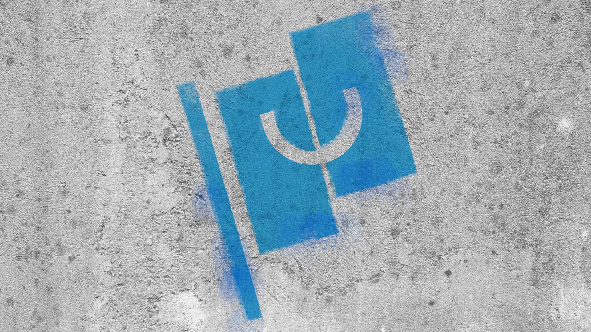 URA flag brand graphic with smile on sidewalk