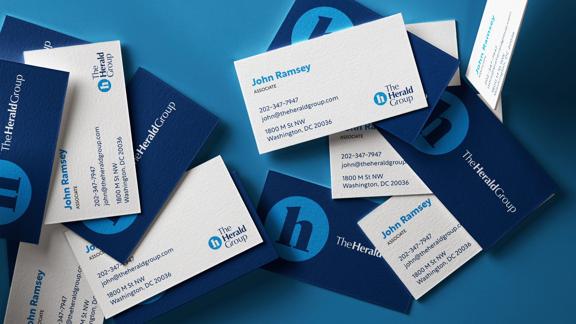 The Herald Group business cards