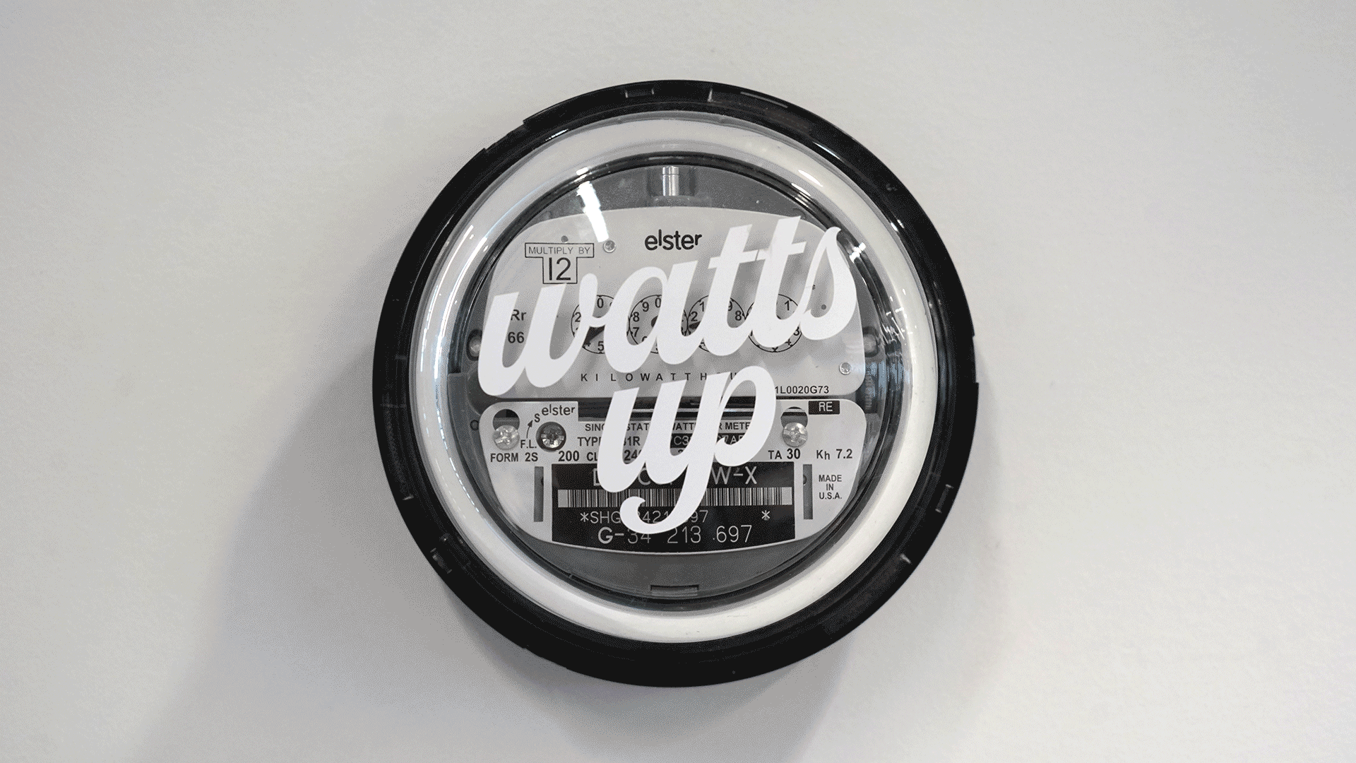 DLC headquarters environmental design installation on old electrical meters with different sayings